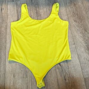 Women’s yellow express bodysuit neon XL
